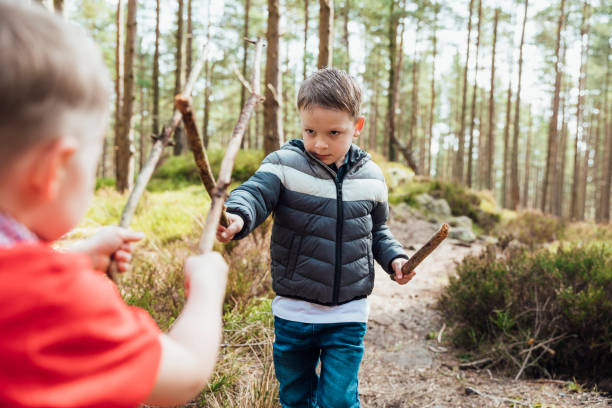 using their imagination - låtsasbråk bildbanksfoton och bilder