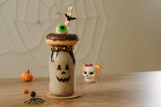 istock Freak Monster shake decorated with chocolate donut and marmelade eye 1339293166