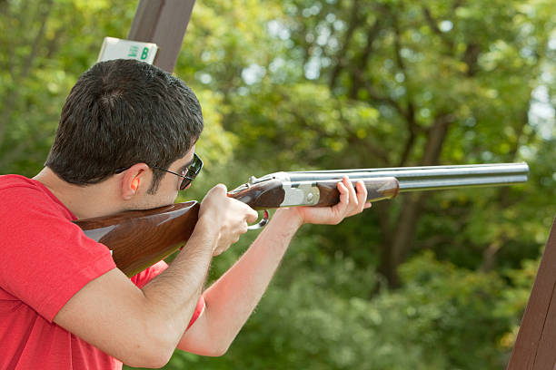 istock Man shooting from the shotgun 133929431