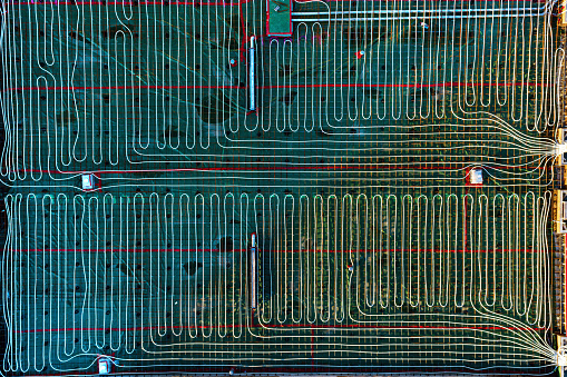 Looking down on an in-floor radiant heating installation for a commercial building.
