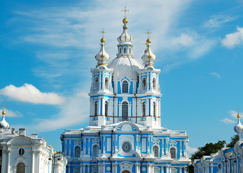 Saint Petersburg, Russia - August 28, 2021: Smolny Cathedral against the blue sky on a sunny day