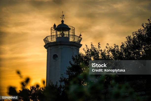 Tower Of The Old Lighthouse Against The Evening Sky Stock Photo - Download Image Now