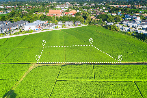 Land plot in aerial view. That identify registration symbol of vacant area for map. That property or real estate for business of home, house or residential i.e. construction, development, sale, rent, buy, purchase, mortgage or investment.