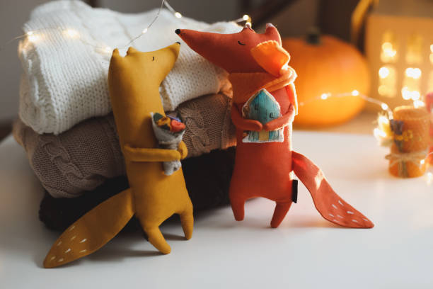 istock cozy autumn composition with a funny handmade toy fox, fall home decoration 1339302102