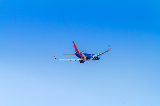 Santa Ana, CA, USA – August 12, 2021: Rear view of a Southwest Airlines Boeing 737 aircraft leaving the John Wayne Airport area in Santa Ana, California.