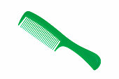Close up photography of beautiful clean empty green color new plastic comb and equipment of hairdresser isolated on white background.