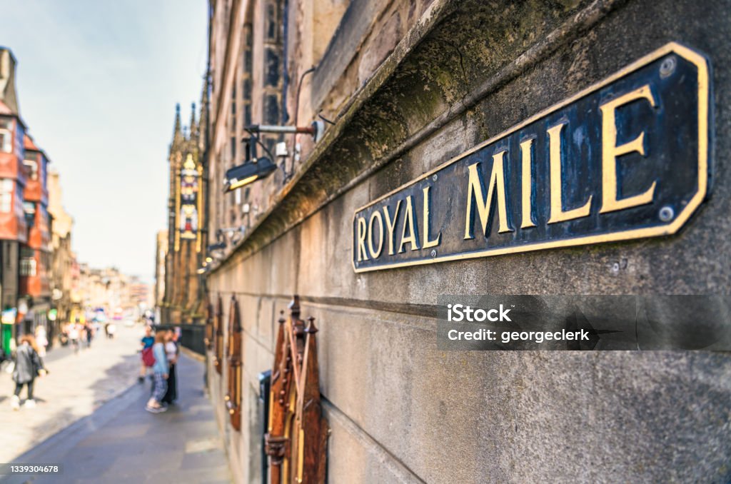 Royal Mile in Edinburgh's Old Town A sign for the famous Royal Mile, the centre of the city's historic Old Town. Edinburgh - Scotland Stock Photo