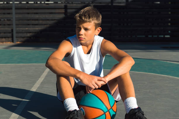istock basketball player at sport ground 1339309793