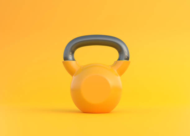 istock Yellow kettlebell on yellow background 1339313605