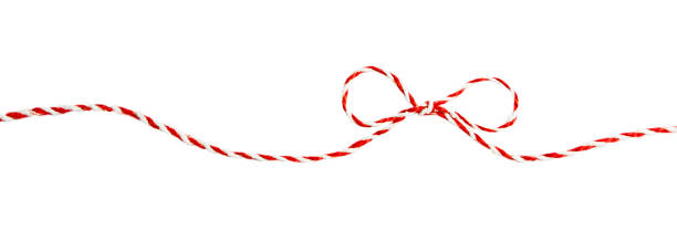 istock String with christmas bow made of rope decor isolated on white background. 1339315049