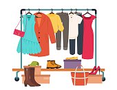 istock Clothes hanging on rack, garment rail with casual women clothing. Fashion girl wardrobe, female clothes on hangers vector illustration 1339317246