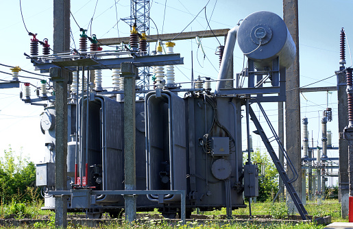 Electrical power transformer in high voltage substation 110 kilovolts. Electrical power distribution.