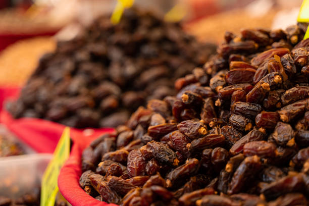istock Dates on counter on Turkish market. Dried sweet dates. 1339322466