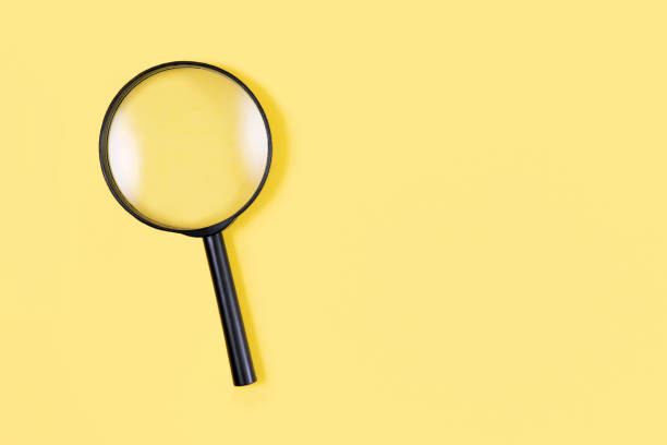 istock Magnifying Glass on Yellow Background 1339322925