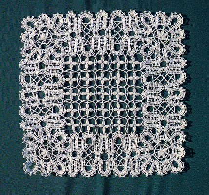 Russian lace is a bobbin tape lace. The designs of Russian lace are of abstract form.