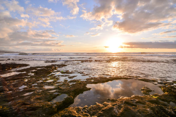 istock The Sun Setting in the Sea 1339326340