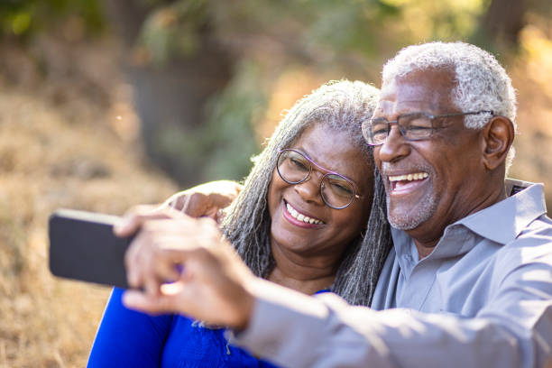 istock Senior Black Couple Taking Selfies 1339327972