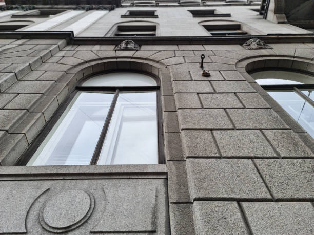 istock Stone building with windows. Stone house in the close-up 1339330547