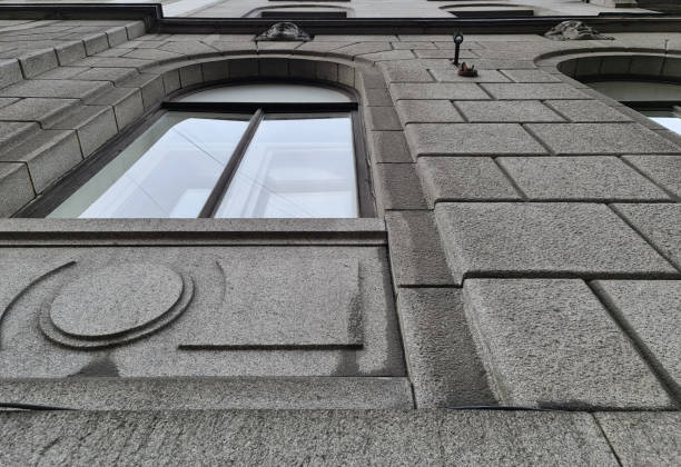 istock Stone building with windows. Stone house in the close-up 1339330552