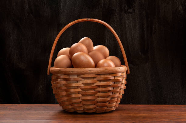 istock Basket of freshly collected eggs 1339340122