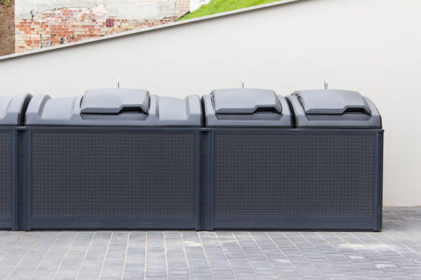 istock Modern trash garbage collecting containers in European city 1339341040