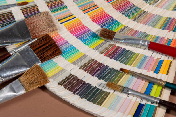 istock Close-up on color palette guide for printing and paintbrush 1339342594
