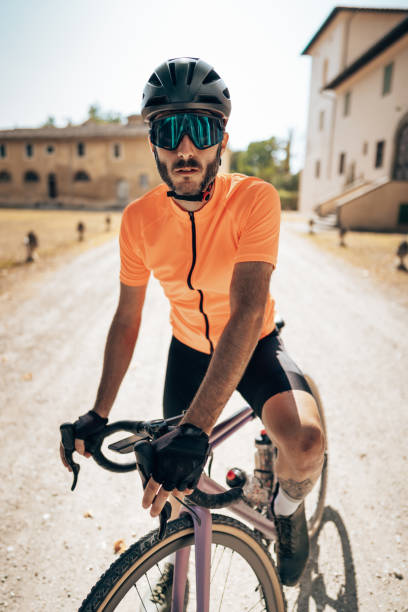 gravel cyclist portrait gravel cyclist portrait cycling vest photos stock pictures, royalty-free photos & images