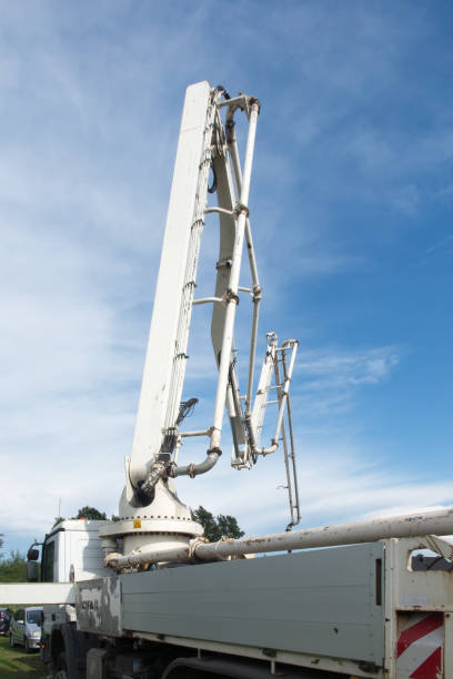 istock pump and hose system for feeding concrete from the mixer 1339344869