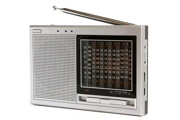 Radio receiver Radio receiver on a white background vintage portable silver radio stock pictures, royalty-free photos & images