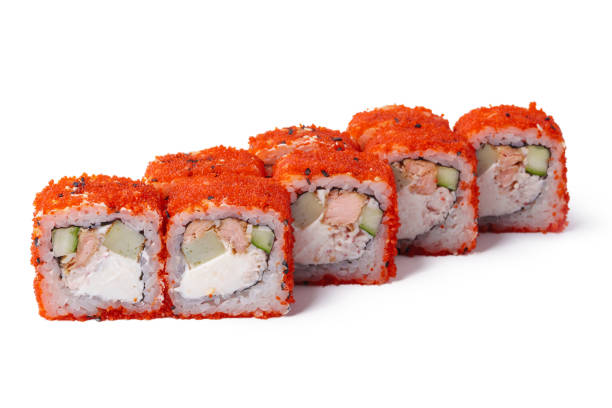 istock Closeup image of sushi rolls isolated at white background 1339351174