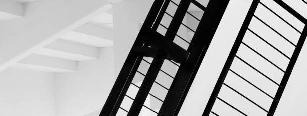 istock modern  white architecture structure and black metal minimalism banner backgroun 1339355065