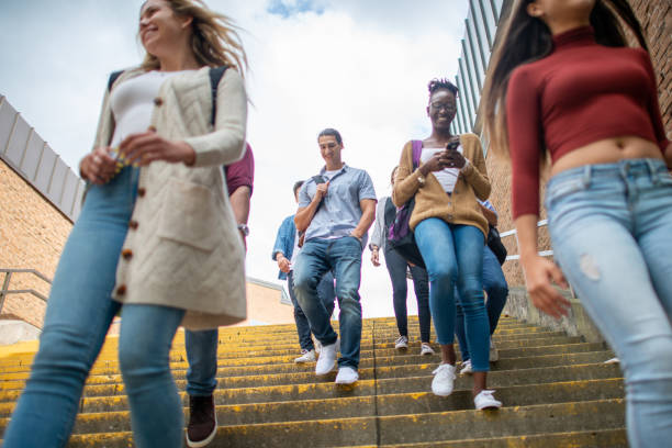 istock Student walking on the stairs on campus 1339358450