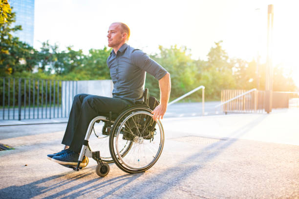 istock Businessman with Physical Disability Rolling into Sunshine 1339362646