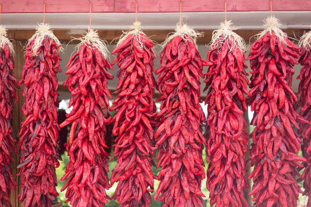 istock Santa Fe, New Mexico: Sunlit Chili Pepper Ristras Hanging 1339366977