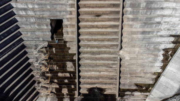 istock Concrete Dam And Spillway Infrastructure 1339373640