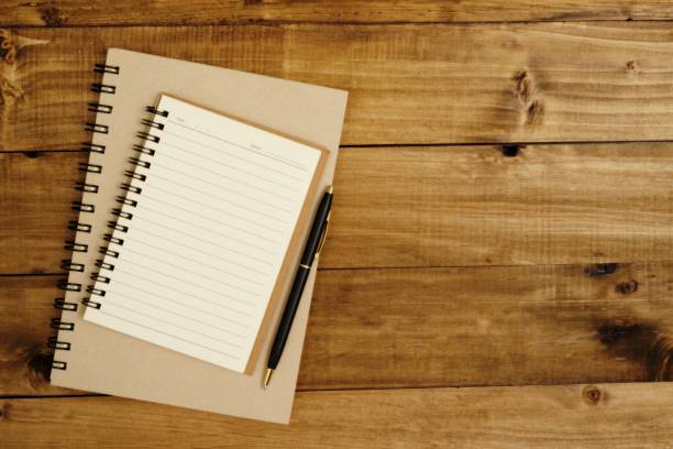 istock 2 books waiting to take notes with 1 pen 1339375337