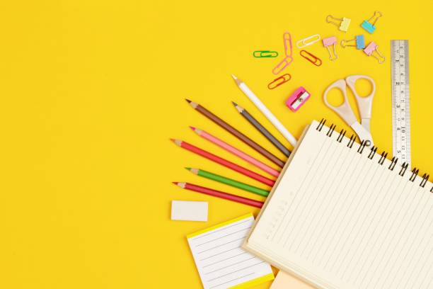 istock Various wooden paints along with drawing tools are placed on a yellow background. 1339375459