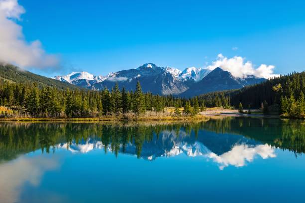 istock Blue Sky And Clouds Reflecting On Cascade Ponds 1339376483