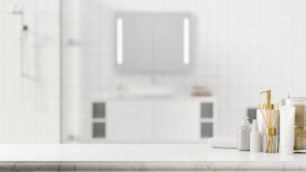 istock Marble bathroom tabletop with bathing accessories and mock-up space over bathroom background, 3d rendering 1339378893