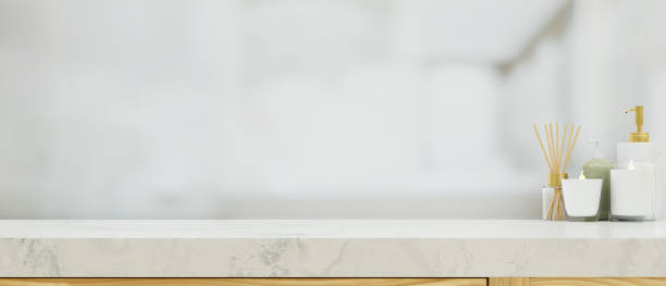 istock Bathroom, Marble table top with mock-up space over blurred bathroom background, 3d rendering 1339378898