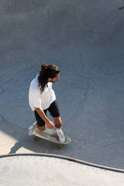 istock Skater inside the bowl at the skate park 1339384055