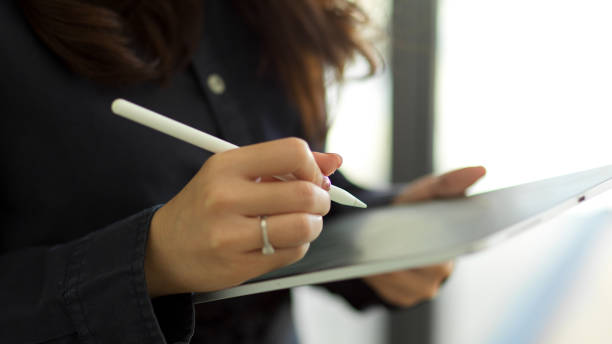 istock Closeup, Success company manager using digital tablet 1339387123