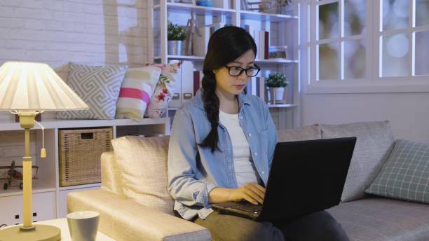 istock office lady laptop working at night 1339387844