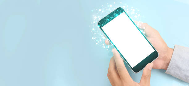 istock Hand holding smartphone and touching screen 1339389695