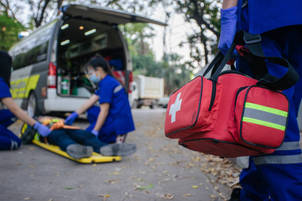 istock Team paramedic firs aid accident on road. 1339395689