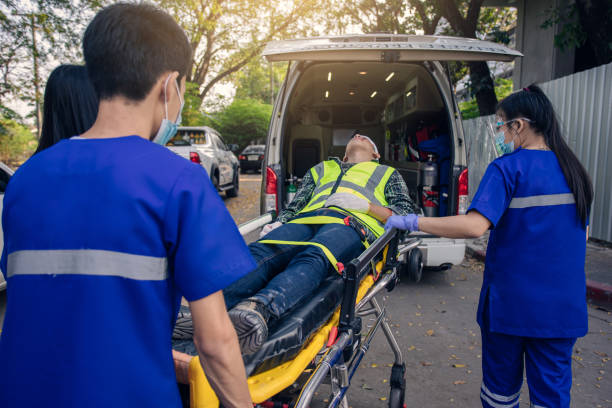 istock Team paramedic firs aid accident on road. 1339395721