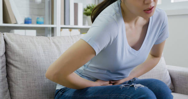 istock lady having a menstruation pain. 1339399909