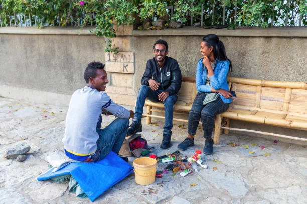young Ethiopians with shoe polisher on the street, Mekelle, Tigray, Ethiopia Mekele, Ethiopia - April 28, 2019: young Ethiopians with shoe polisher on the street in Mekelle, second largest city and capital of Tigray region, in Ethiopia Africa ethiopia city stock pictures, royalty-free photos & images