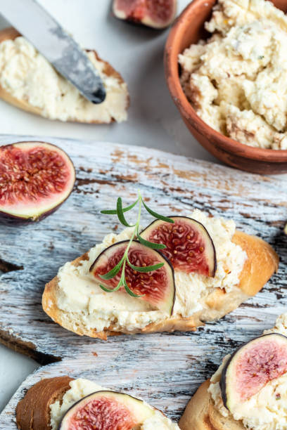 istock Sandwiches with ricotta cheese, figs, Delicious appetizer, ideal aperitif. top view 1339402524