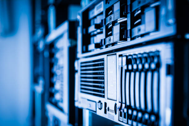 cluster of data storage ssd hard drives inside server rack - network server rack computer mainframe imagens e fotografias de stock